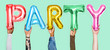 © Rawpixel.com - Hands showing party balloons word
