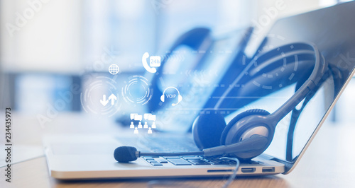 Fotografía close up soft focus on headset with telephone devices at office desk for custome