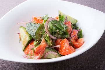 Fresh raw tomato and cucumber mixed salad