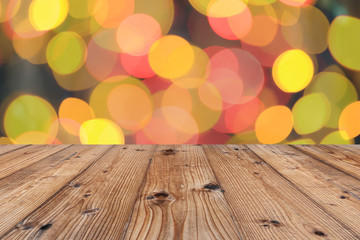 Brown old wooden floor on Christmas bokeh backdrop and have copy space.