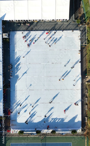 Aerial View Of People Ice Skating On An Outdoor Ice Rink Buy