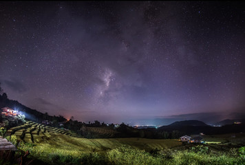 Wall Mural - the milky way galaxy on the rice field on the mountain.long exposure photograph, with grain.image co