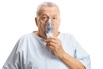 Wall Mural - Mature male patient with an inhalation mask