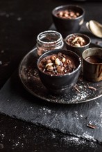 Chocolate Cream With Nuts And Icing Sugar