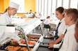© Monkey Business - High School Students Wearing Uniform Being Served Food In Canteen