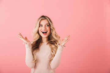 Poster - Portrait of a cheerful young woman wearing sweater