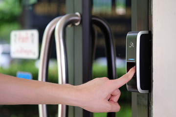 Aufkleber - man paste finger to biometric fingerprint scanner. security, door access control, validation, cybers