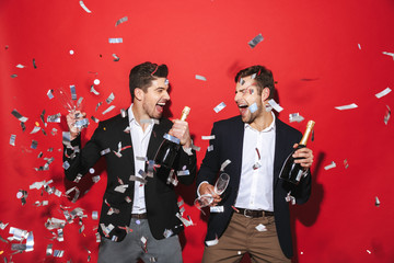 Wall Mural - Two cheerful smartly dressed men standing