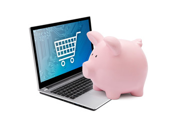Fototapete - Piggy bank and laptop with shopping cart graphic. Saving concept 