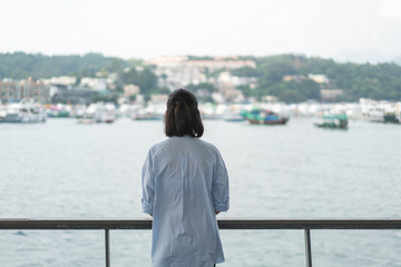 Young Asian woman travel at the beach in Hong Kong