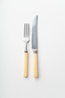 © Anastasiia Nurullina - Vintage knife and fork on white background
