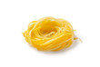 yellow squash vegetable noodles. spiralized squash. isolated on white background.