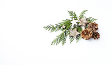 An Arrangement Of Evergreen Twigs And Christmas Decorations. Flatlay. Copy Space. White Background