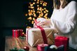 Girl wrapping a Christmas Gift