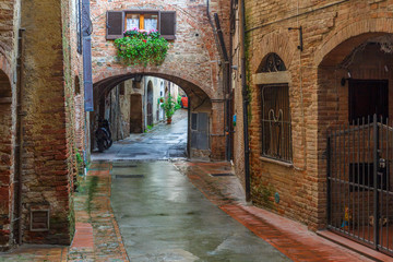 Canvas Print - Arches on an Italian back street in a city