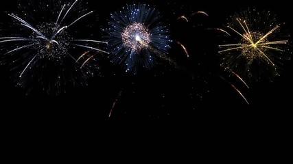 Brightly colorful fireworks for New Year and other events celebration on dark background. 4k