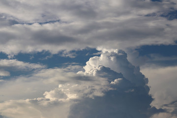 clear blue sky with cumulus and cirrus clouds. sunny weather. joyful mood. high pressure. clean air 