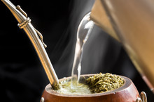 Water Served Into Steaming Yerba Mate Infusion 