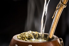 Water Served Into Steaming Yerba Mate Infusion 
