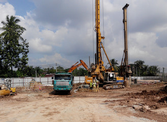 Wall Mural - Construction site in progress at Malacca, Malaysia during daytime. Daily activity is ongoing. 