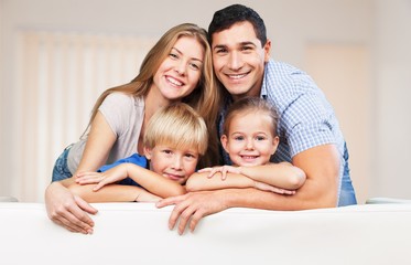 Wall Mural - Beautiful smiling Lovely family indoors