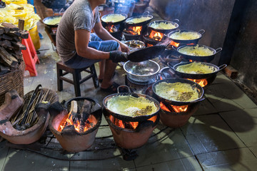 Banh xeo, Vietnamese traditional street food yellow crispy rice flour cake. Sizzling cake, named for the loud sizzling sound it makes when the rice batter is poured into the hot skillet