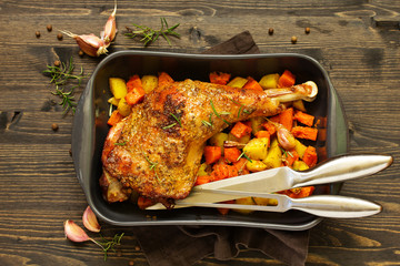 Wall Mural - baked turkey thigh with vegetables.