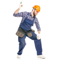 Wall Mural - Young man builder industry worker with a hammer on white background isolation