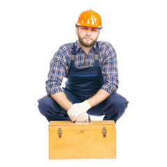 Wall Mural - Young man builder with toolbox industry worker hardhat on white background isolation