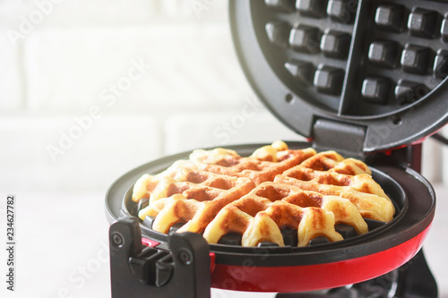 Fotomural The process of making homemade waffles