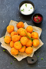 Wall Mural - cheese balls with tomato sauce.