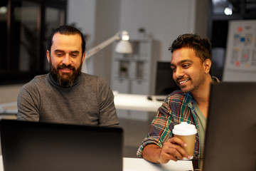 Poster - deadline, technology and people concept - creative team drinking coffee and working with computers late at night office