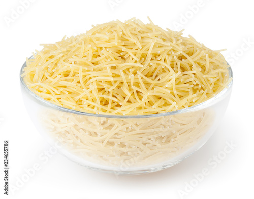 Fotografía Uncooked vermicelli pasta in glass bowl isolated on white background with clippi