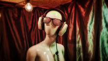 Hypnotic Glasses And Vintage Headphones On A Female Mannequin.