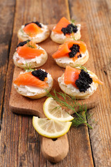 Wall Mural - bread with cheese, salmon and caviar