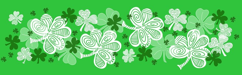 Shamrock four leaf clover, St Patrick's Day, March green and white banner header background in wide horizontal format