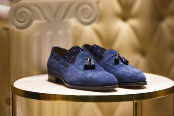 Men elegant shoes in a store in Paris, 2018.