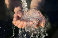 Hands Washing With Water Pouring From A Tap