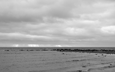 Wall Mural - Dark cloud over sea.