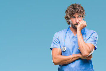 Sticker - Handsome hispanic surgeon doctor man over isolated background looking stressed and nervous with hands on mouth biting nails. Anxiety problem.