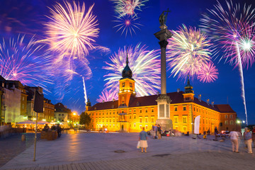 Wall Mural - Fireworks display over The Royal Castle  square of Warsaw, Poland