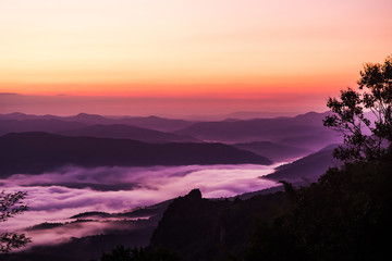  sunset overlooking mountains with Mist