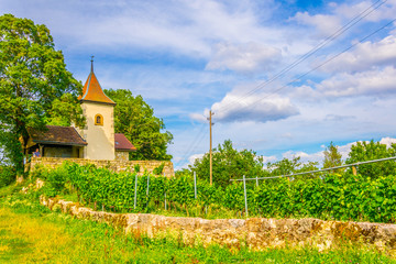 Wall Mural - A chapel near Tüscherz situated behind vineyards of Bielersee, Switzerland