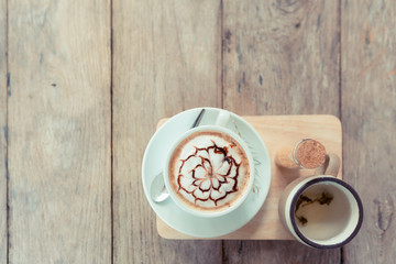 Wall Mural - latte art coffe on wood table