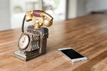 new and old telephone