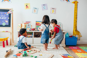 young children enjoying in the playroom