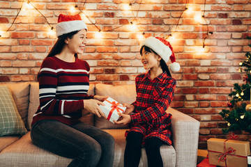 asian family celebrate at home in christmas