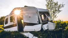 Wrecked Caravan With Sun Shining Through