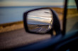 Iceland road in rear view mirror