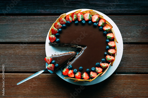 Delicious Chocolate Cake Decorated With Fresh Strawberries